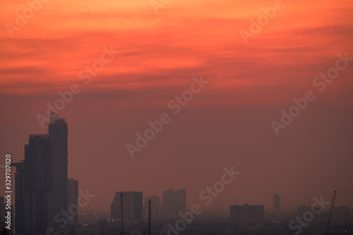 abstract background of the evening sky and the surrounding buildings, showing the distribution of housing in the capital © bangprik
