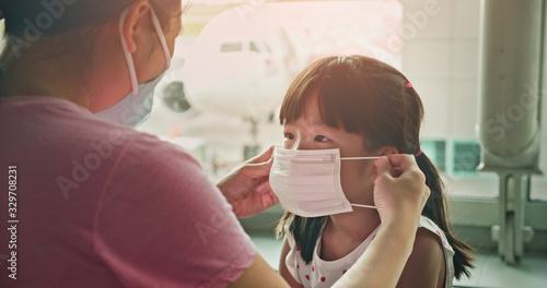 parents wear masks to children photo