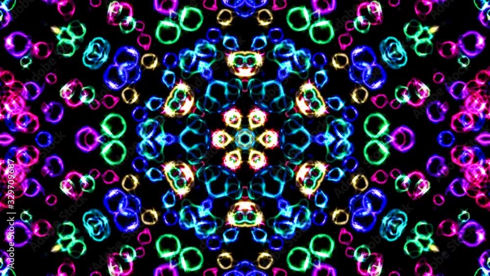 Beautiful abstract video that shines, bright light that arranges subtle colorful movements with a flower shape, black background Beautiful abstract video that shines, bright light that arranges subtle colorful movements with a flower shape, black background