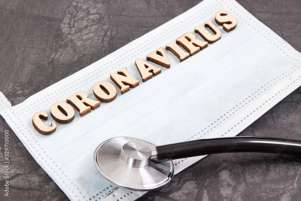 Inscription coronavirus with protective mask and stethoscope. Novel Chinese coronavirus. 2019-nCoV Inscription coronavirus with protective mask and stethoscope. Novel Chinese coronavirus. 2019-nCoV