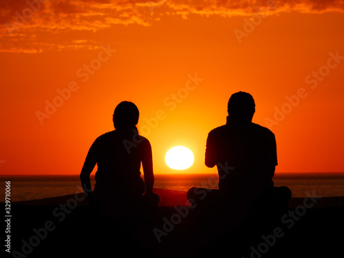 couple infront of amazing sunset