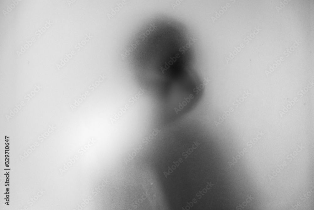 Shadow blur of man wear mask to prevent infection background.Fight against communicable diseases covid-19.Black and white picture.Blur picture.Fight deadly communicable diseases coronavirus.Soft focus Shadow blur of man wear mask to prevent infection background.Fight against communicable diseases covid-19.Black and white picture.Blur picture.Fight deadly communicable diseases coronavirus.Soft focus