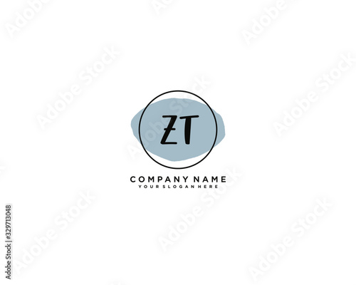 Letter ZT handwrititing logo with a beautiful template photo