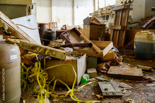 Photo of a garbage dump in an abandoned room photo