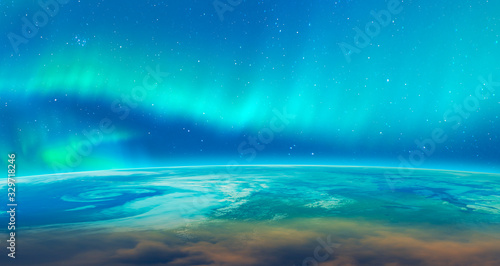 Northern lights aurora borealis over planet Earth "Elements of this image furnished by NASA" © muratart