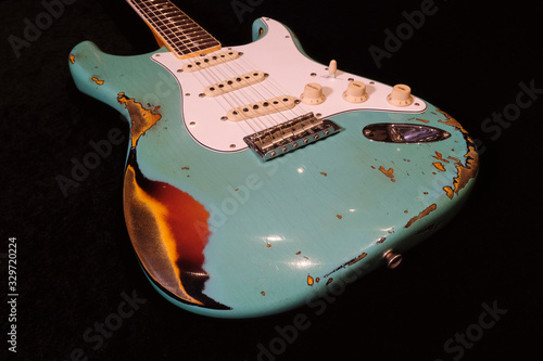 close up detail of electric guitar Body heavy Relic with selective focus.