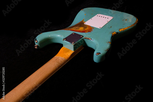 close up detail of electric guitar Body heavy Relic with selective focus.