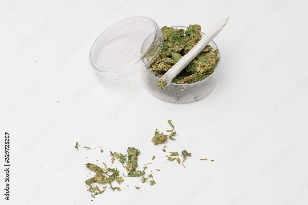 Marijuana cannabis Medicinal, weed joint In a glass container, drugs.