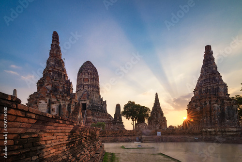 Long exposure of Chaiwattanaram temple with twilight sky in sunset time in Ayuttaya, Thailand.