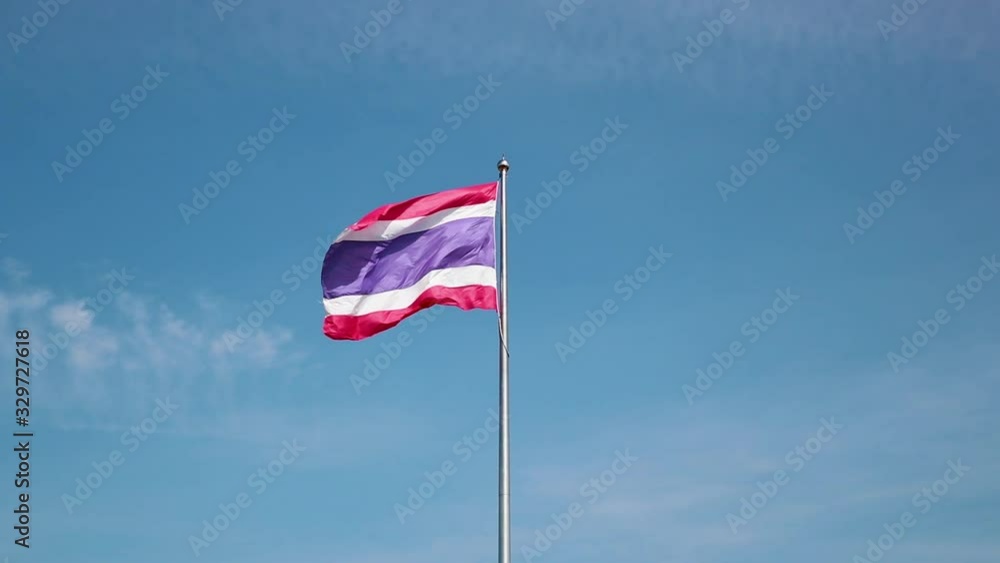 Thai national flag in blue sky Thai national flag in blue sky