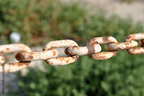 Vintage chain, old rusty steel close up