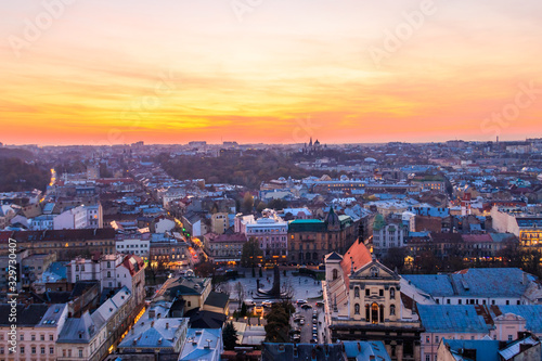 Aerial view of the old town of Lviv in Ukraine at sunset. Lvov cityscape. View from tower of Lviv town hall