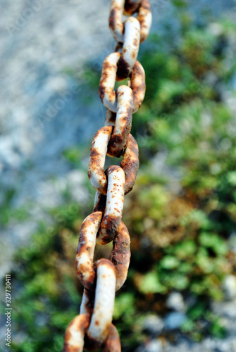 Vintage chain, old rusty steel close up
