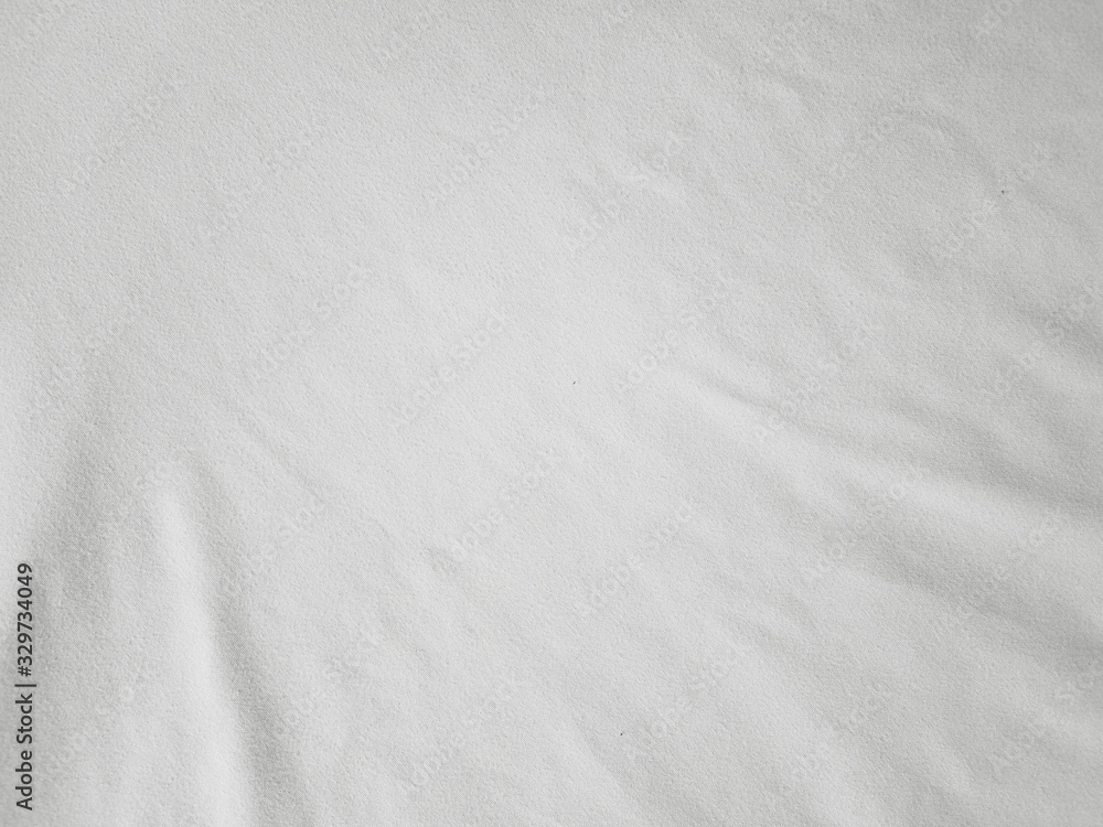 Soft white wrinkled fabric background Soft white wrinkled fabric background
