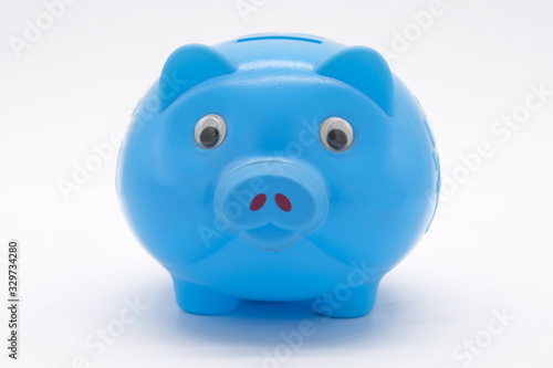 Blue piggy bank or money box isolated on a white background