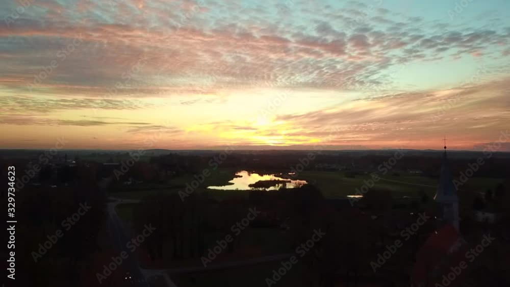 aerial view of old church with historic architecture in sunset at nõo estonia during autumn aerial view of old church with historic architecture in sunset at nõo estonia during autumn