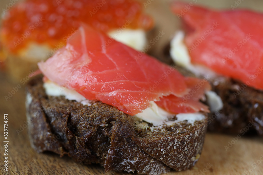 healthy sandwich with red fish and brown bread healthy sandwich with red fish and brown bread