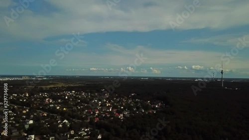 right pan shot from suburb mahe island to maardu shipyard and tallinn tv tower in estonia photo