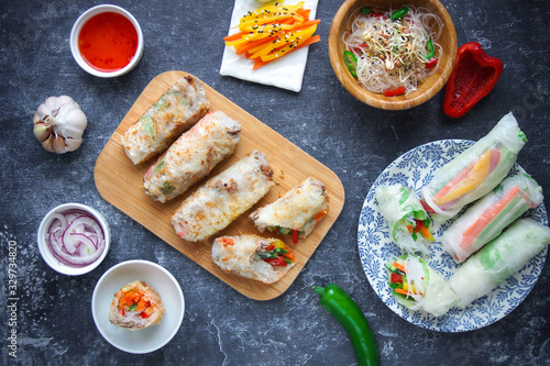 Rice paper rolls with vegetables on a dark background, Vietnamese cuisine, Spring rolls, Asian food