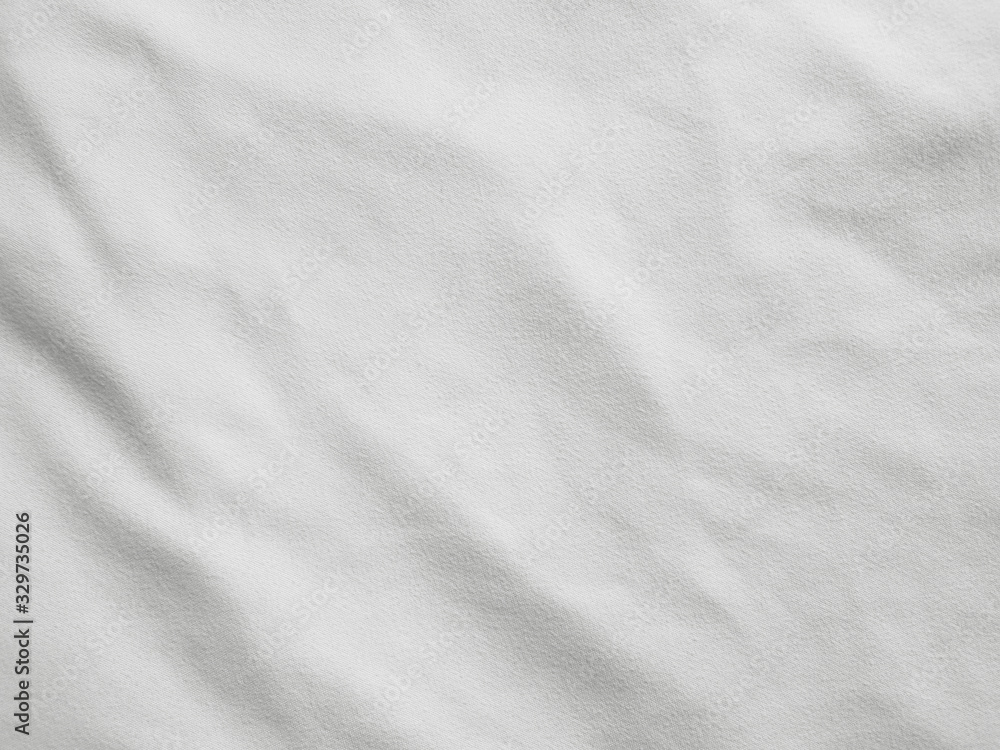 Soft white wrinkled fabric background Soft white wrinkled fabric background