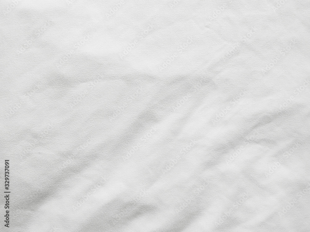 Soft white wrinkled fabric background Soft white wrinkled fabric background