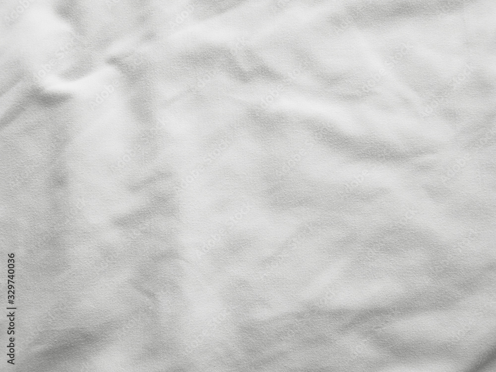 Soft white wrinkled fabric background Soft white wrinkled fabric background