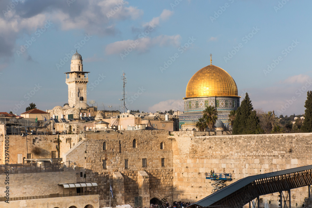 Al-Aqsa Mosque, the shrine of Islam in Jerusalem. Dome of the Rock, located on the Temple Mount in the Old Town, in the foreground a wailing wall