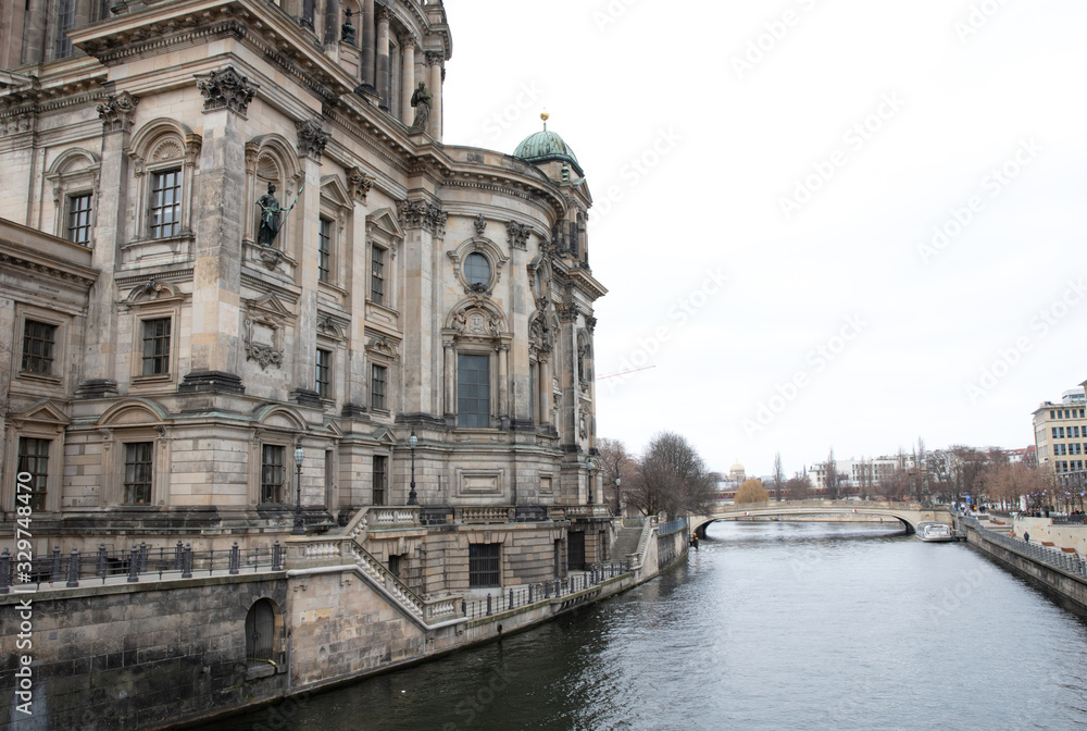 Berlin, Germany on Januari 1, 2020: Cathedral seen from river. Protestant church. Dom. Baroque architecture. Architectural