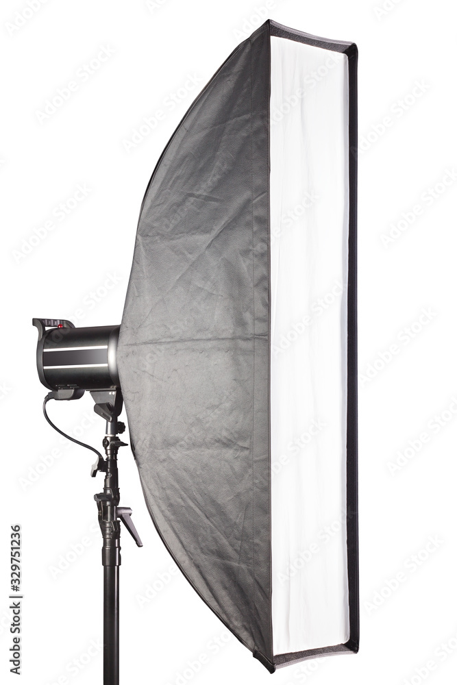 Fototapeta premium Photography studio flash with softbox isolated on white background with lamp.