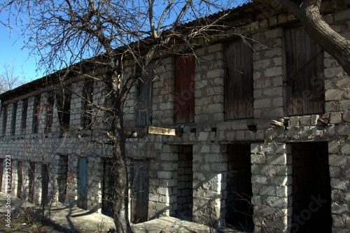 old crumbling abandoned two-story barn