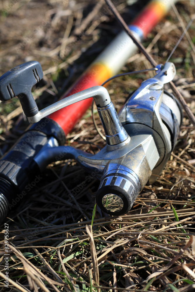 fishing rod on the ground close up fishing rod on the ground close up