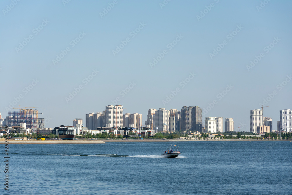 city view behind the lake