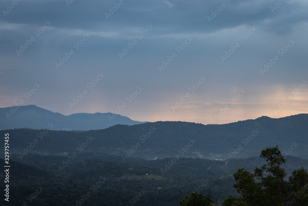 Misty mountains range with amazing sky Misty mountains range with amazing sky