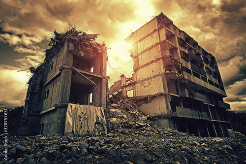 Post-apocalyptic destroyed building in city photo