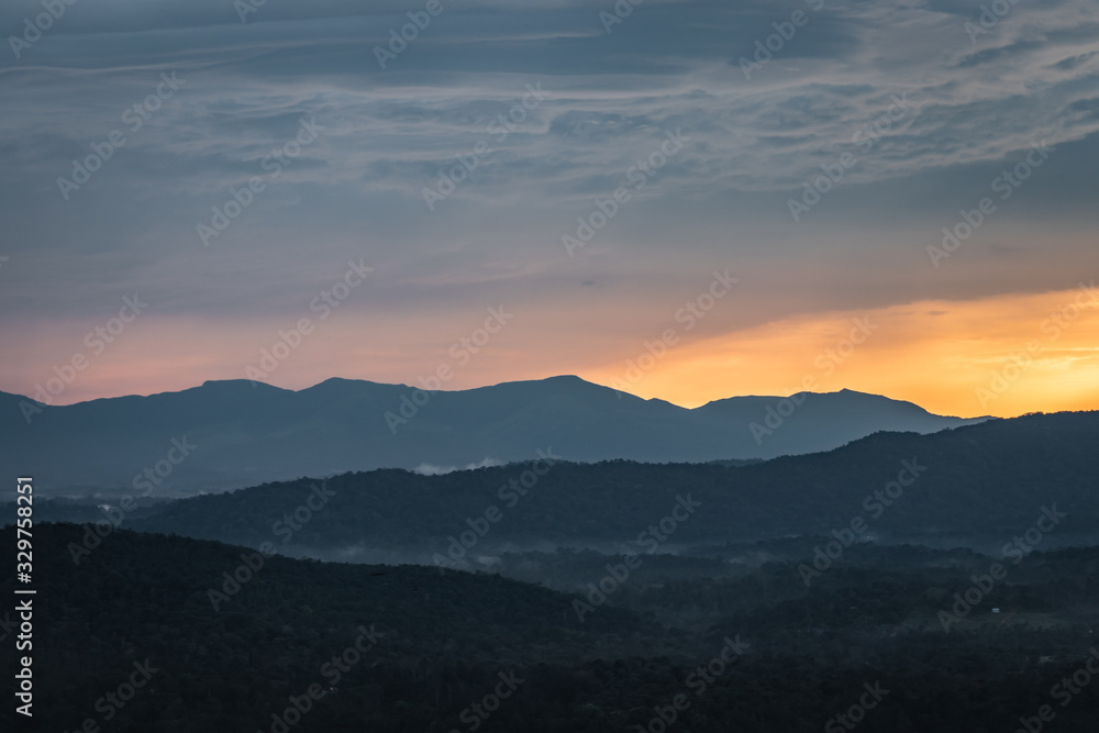 Misty mountains range with amazing sky Misty mountains range with amazing sky