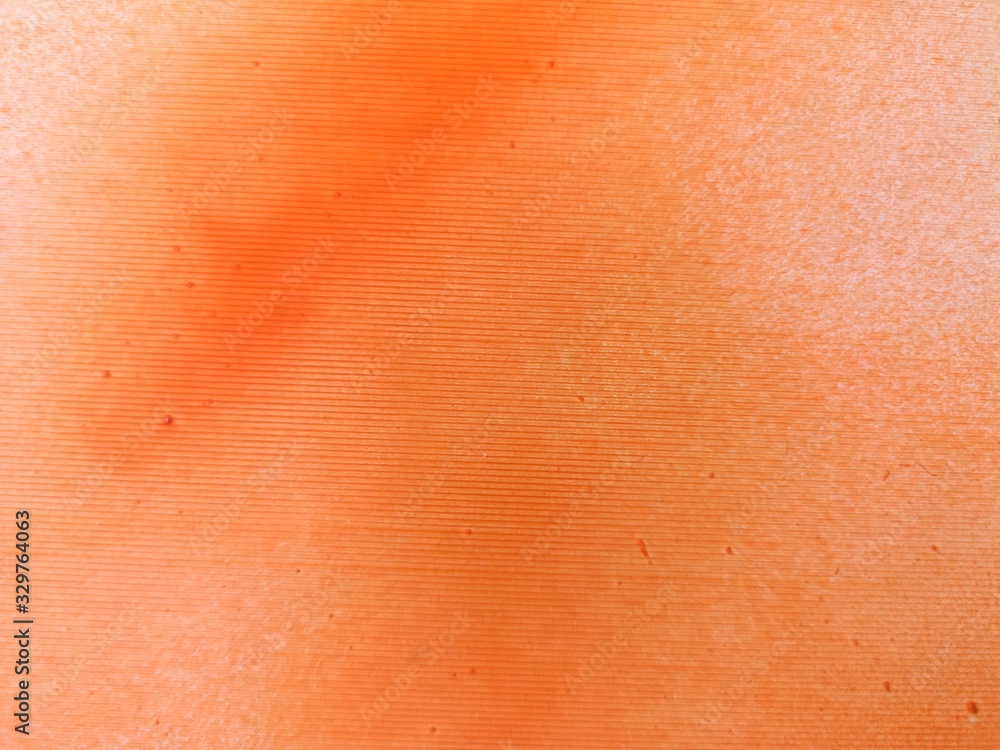 Fototapeta premium spray orange on Corrugated paper Abstract color wallpaper Graphic arts paper background, gradient dot texture