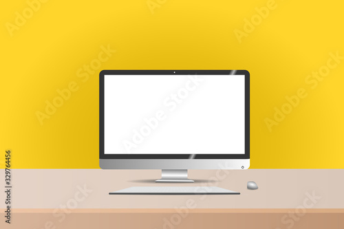 A Computer on Wooden Table and yellow wall Background. White Screen for Mockup.