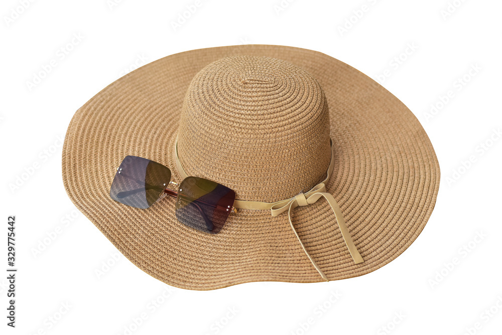 hat and sunglasses isolated on a white background. Top view of beach