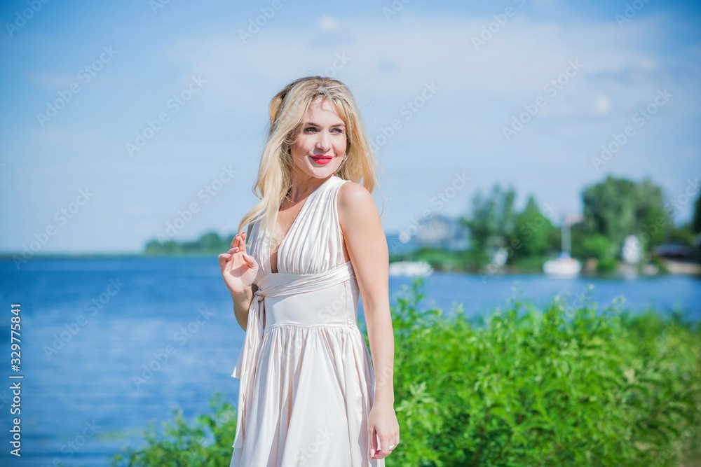 Fototapeta premium Romantic scene, woman waiting on a date. Pretty nice blond hair lady