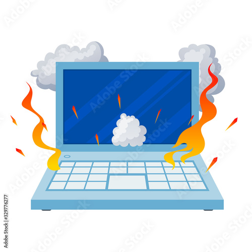Broken open laptop, damaged equipment in fire
