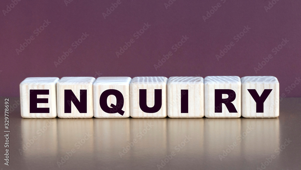 Obraz premium enquiry word on cubes on a burgundy background