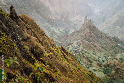 Surreal view to atmosphere in the fertile Xo-xo valley. Scenic landscape of bluff green mountain slopes and rocks. Santo Antao cape Verde