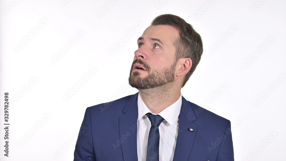 Portrait of Scared Young Businessman Feeling Afraid, White Background Portrait of Scared Young Businessman Feeling Afraid, White Background