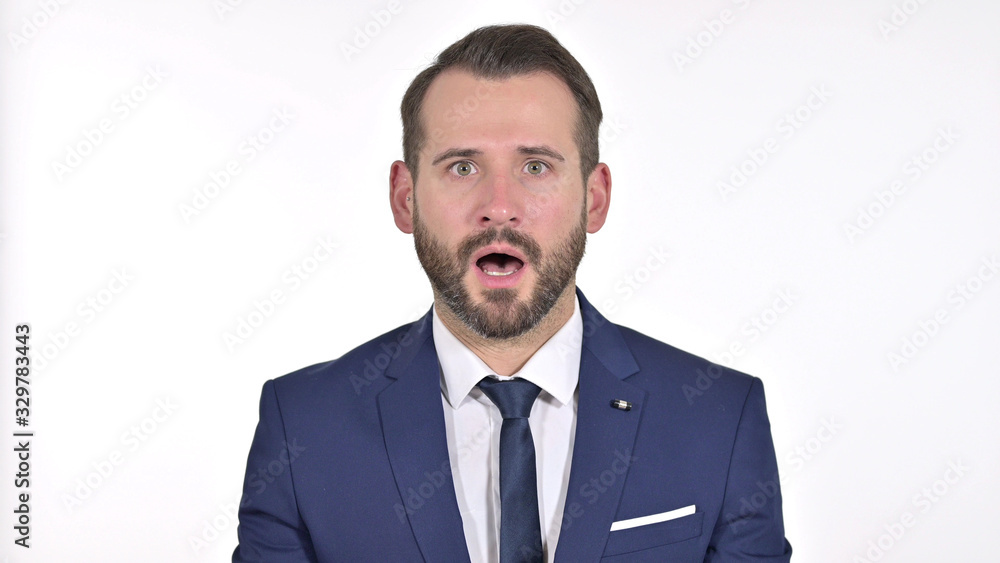 Young Businessman in Shock, White Background Young Businessman in Shock, White Background