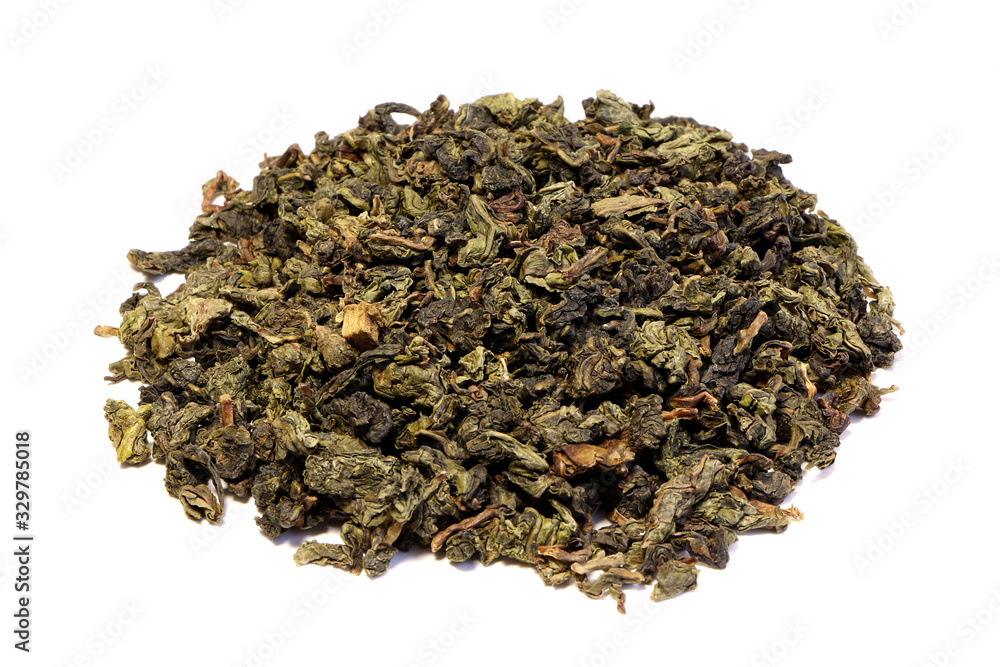 A green tea isolated on a white background. Pile of green tea. A green tea isolated on a white background. Pile of green tea.