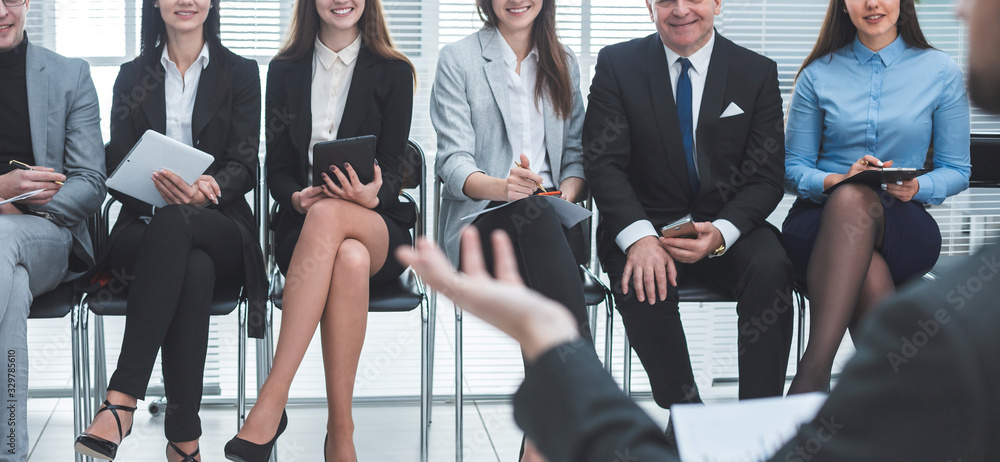 group of employees at a working meeting with the project Manager