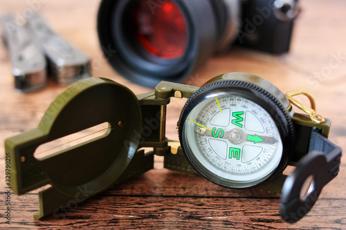Travel compass, multitool and camera