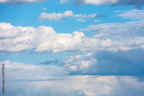 Thick clouds in the sky. Cloudy weather with clouds and clouds. On the sky clouds.