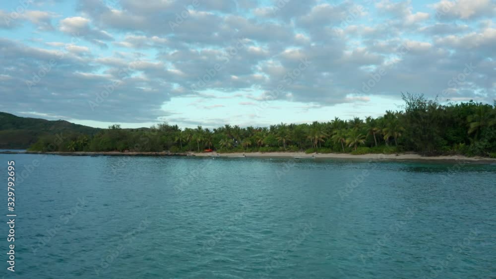 A very calm and relaxing view of the sunset of Fiji Island - Wide Shot A very calm and relaxing view of the sunset of Fiji Island - Wide Shot