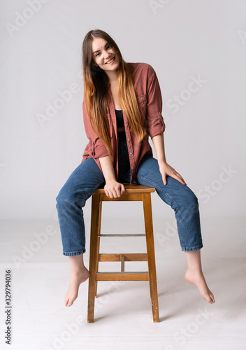 Young caucasian woman posing in studio